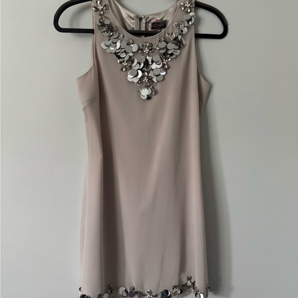 Elegant Beige Sleeveless Dress with Embellishments